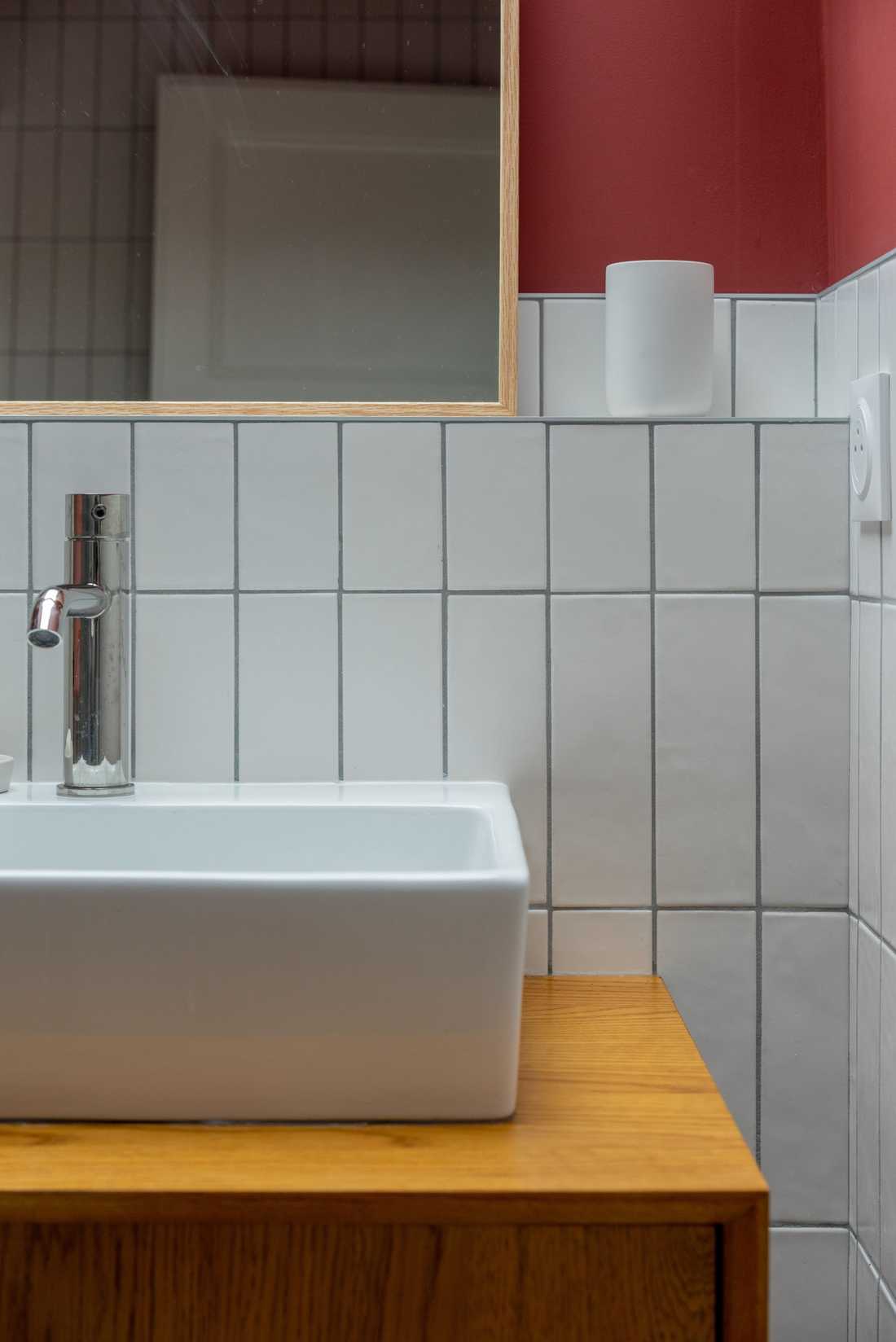 Rénovation d'une salle de bain rose par un architecte d'intérieur